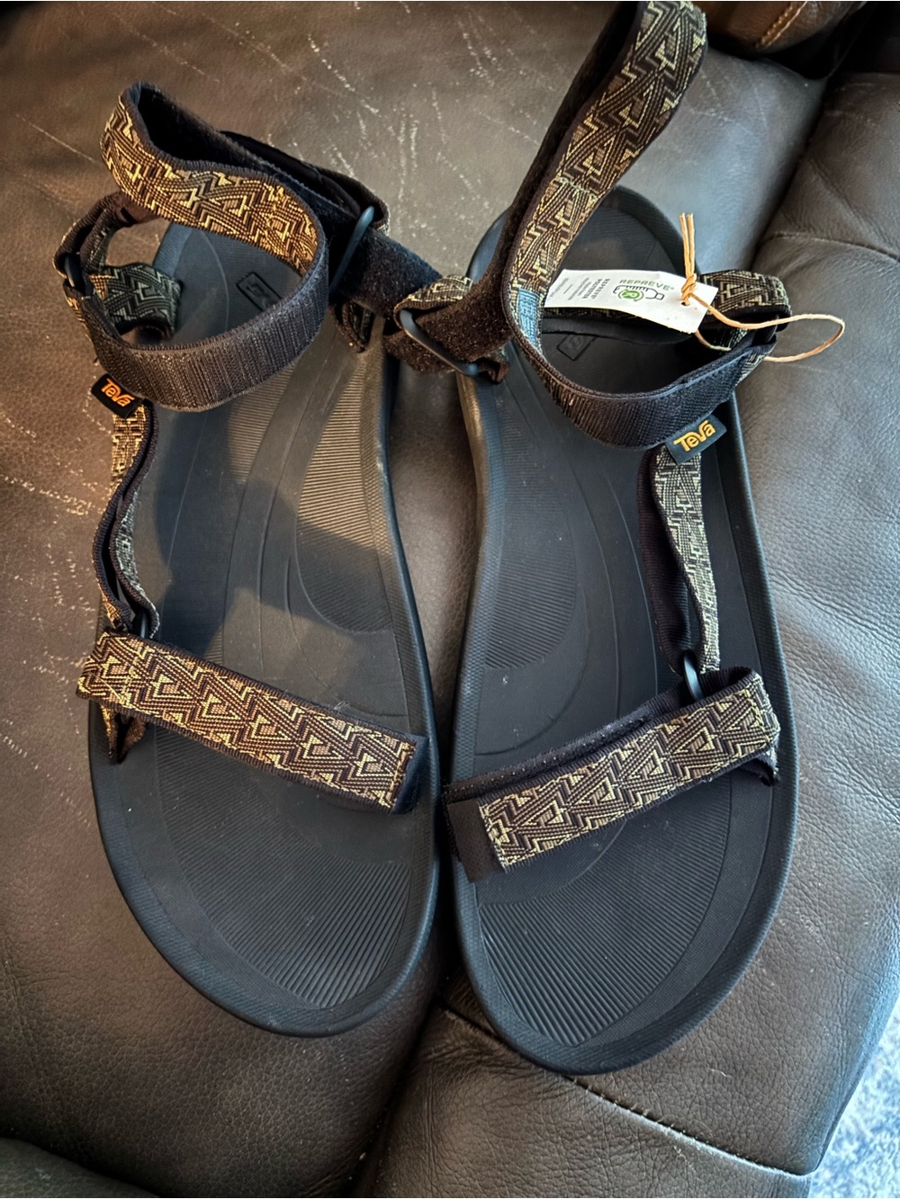 Teva Men’s size 15. Black Sandals with Brown Patterned Straps
